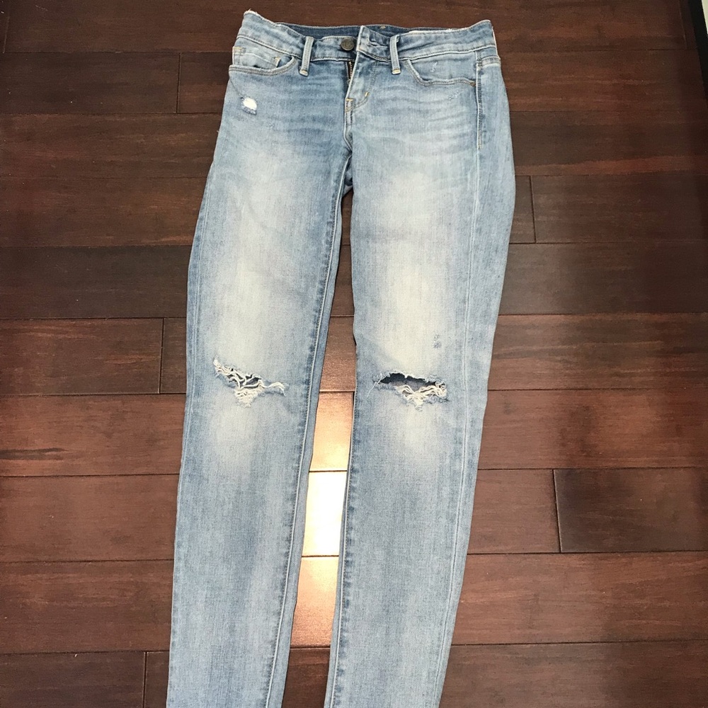 Ripped Knee Jeans